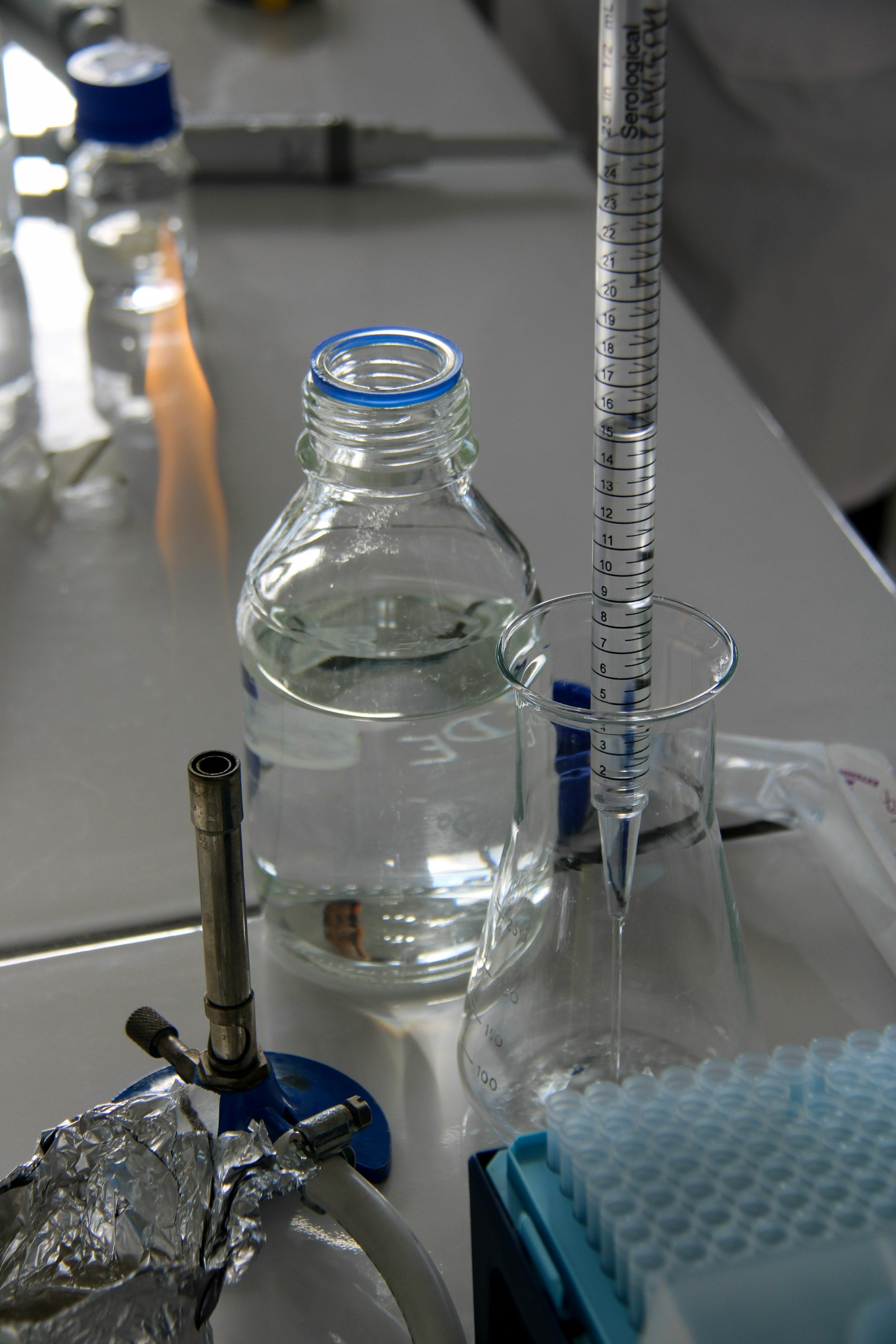Laboratory pipette and glassware used to introduce BioraLab research notes